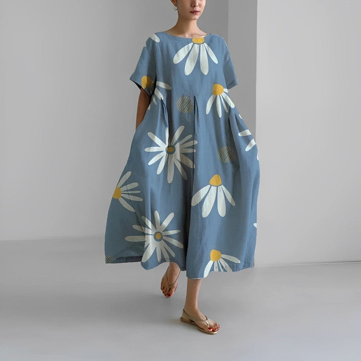 Abito lungo estivo donna Zoe in stile boho chic, perfetto per l'eleganza casual delle giornate estive.
