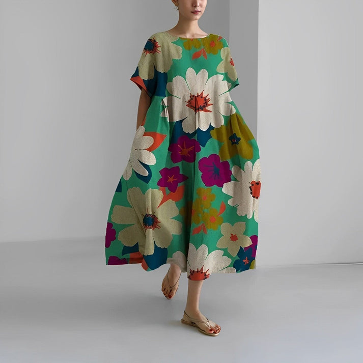 Abito estivo donna Zoe, lungo e fluente, ideale per un'eleganza estiva senza sforzo in stile boho.