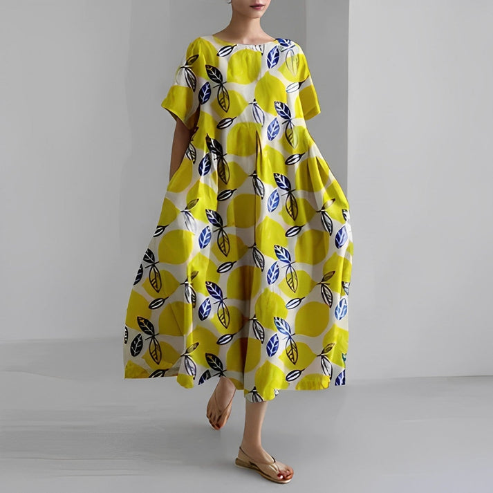 Vestito estivo lungo Zoe per donna, stile boho chic e leggero, esalta l'eleganza estiva con comfort.