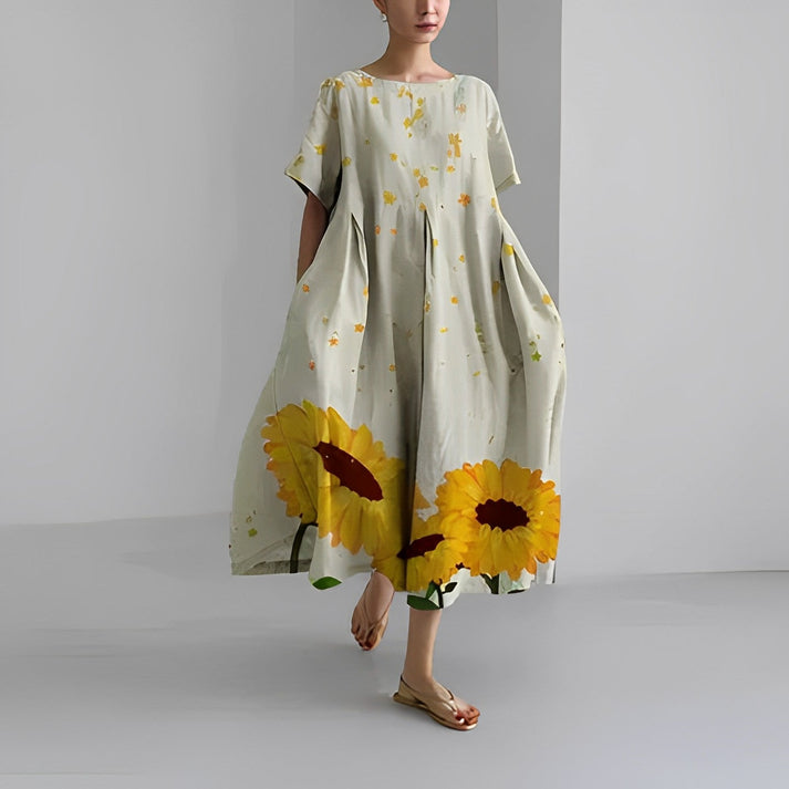 Abito donna maxi Zoe, elegante e svolazzante, un must-have boho chic per le tue serate estive.