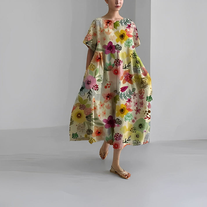 Abito donna lungo Zoe, stile boho chic per l'estate, un outfit elegante e confortevole per la moda mare.
