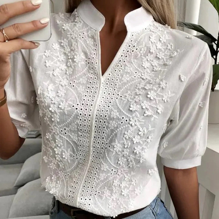Camicetta bianca elegante da donna con peplum, stile chic raffinato per primavera/autunno, ideale formale/casual.