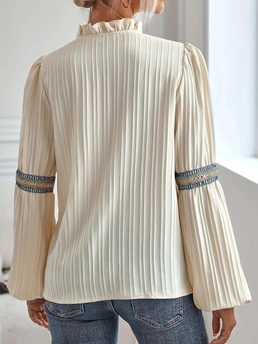 Camicetta donna elegante vintage con maniche lunghe, ideale per moda femminile e abbigliamento casual chic.