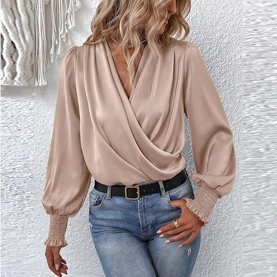 Blusa elegante da donna, modello avvolgente. Perfetta per look formali, ufficio o serate casual-chic in primavera.