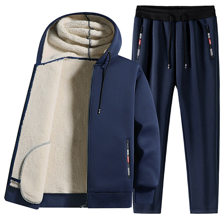 Tuta termica invernale da uomo in morbido pile. Completo caldo con giacca full zip e pantaloni per massimo comfort nel freddo.