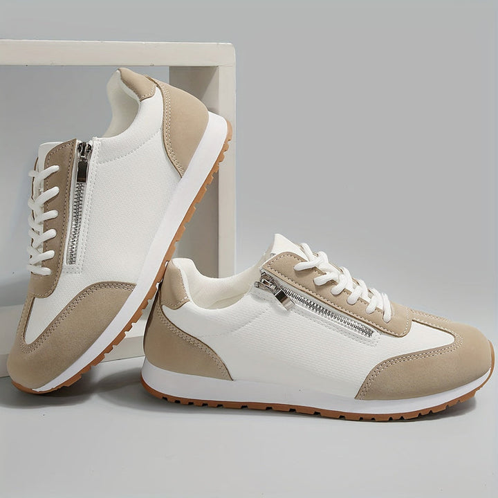 Scarpe da donna casual con suola stabilizzante e tallone rinforzato per comfort quotidiano e calzata sicura.