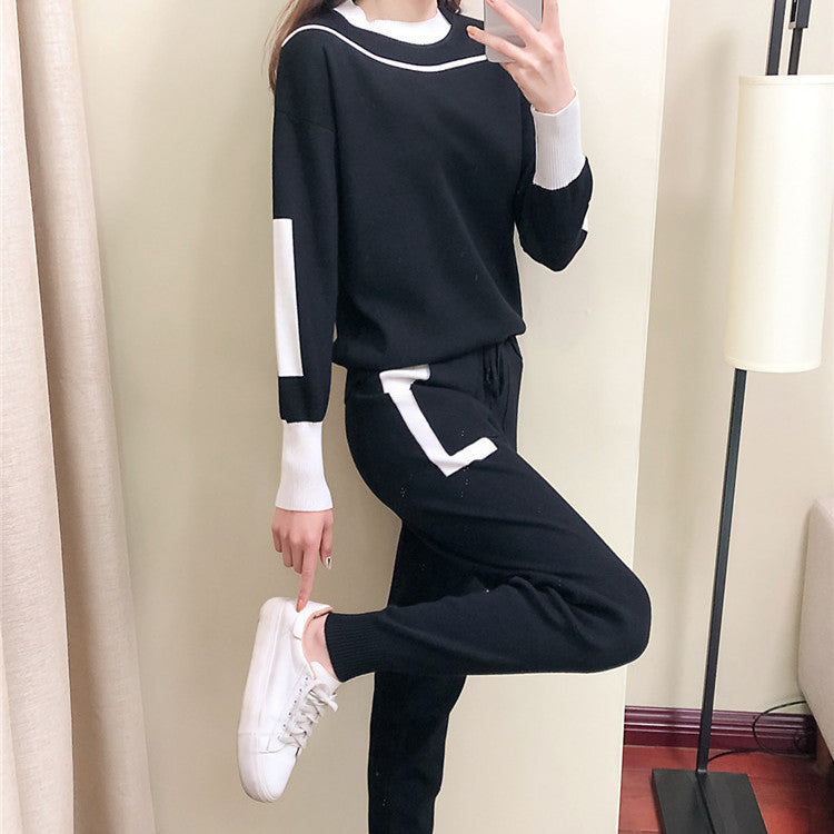Completo donna autunnale elegante color-block con maglia a maniche lunghe e pantaloni. Ideale per il tempo libero.