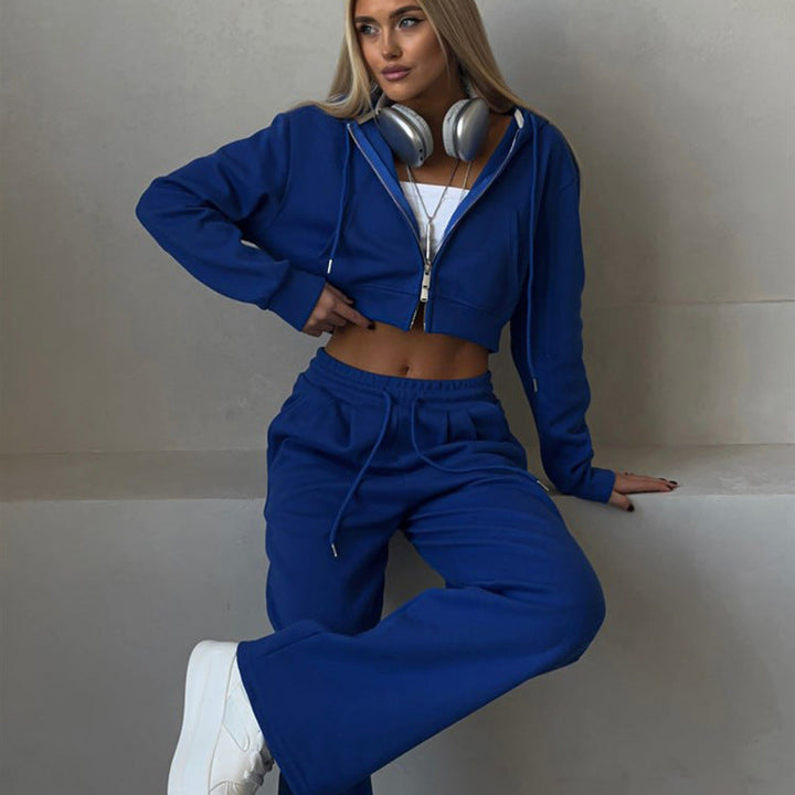 Tuta sportiva donna crop per primavera, completo casual due pezzi con cardigan e pantaloni. Abbigliamento comodo e trendy.
