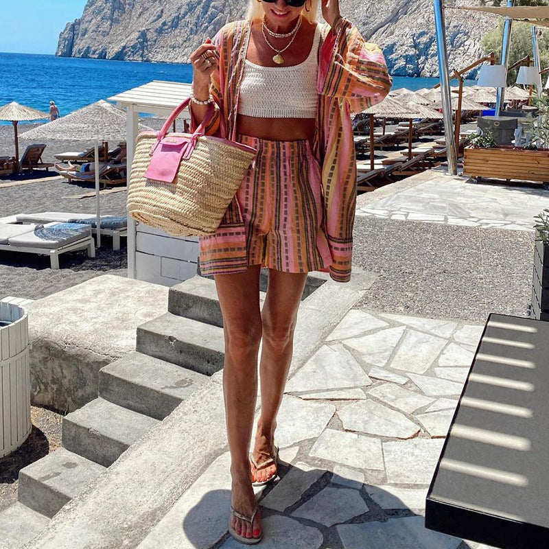 Completo estivo donna floreale arancione con top manica lunga e shorts comodi. Set due pezzi casual primavera estate.