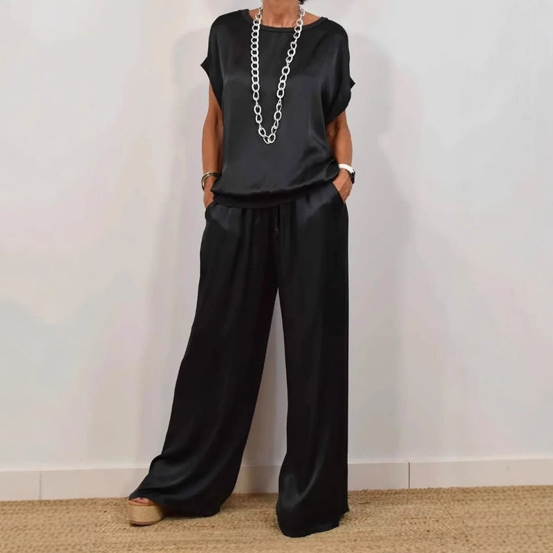 Set coordinato donna comodo: camicia larga e pantaloni fluidi. Ideale per un abbigliamento casual chic e di moda.