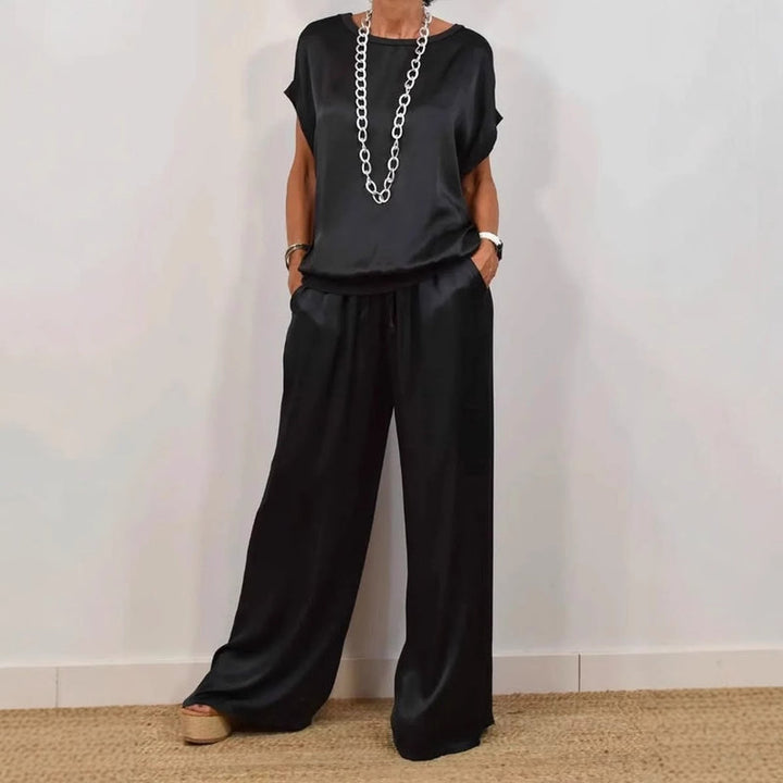 Set coordinato donna comodo: camicia larga e pantaloni fluidi. Ideale per un abbigliamento casual chic e di moda.