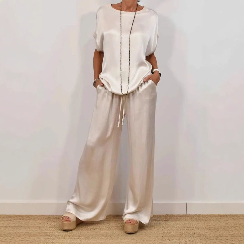 Outfit donna moda: completo due pezzi con camicia oversize e pantaloni a palazzo. Stile comodo per primavera estate autunno inverno.