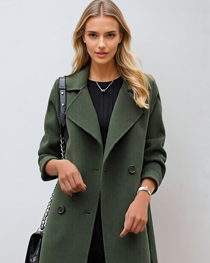 Trench lungo donna elegante con cintura, perfetto per l'autunno-inverno.