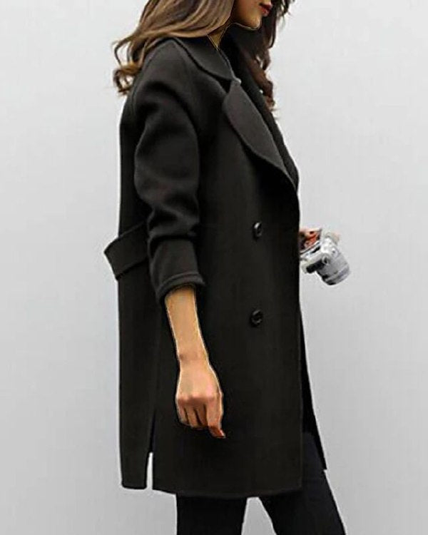 Trench lungo invernale donna con tasche e cintura regolabile, stile classico.
