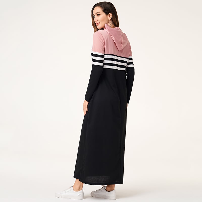 Maxi abito donna autunnale aderente a maniche lunghe. Design patchwork a righe per un look elegante e versatile.