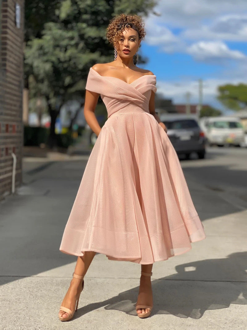Abito da festa donna elegante primaverile, con spalle scoperte e schiena nuda. Perfetto per occasioni speciali.