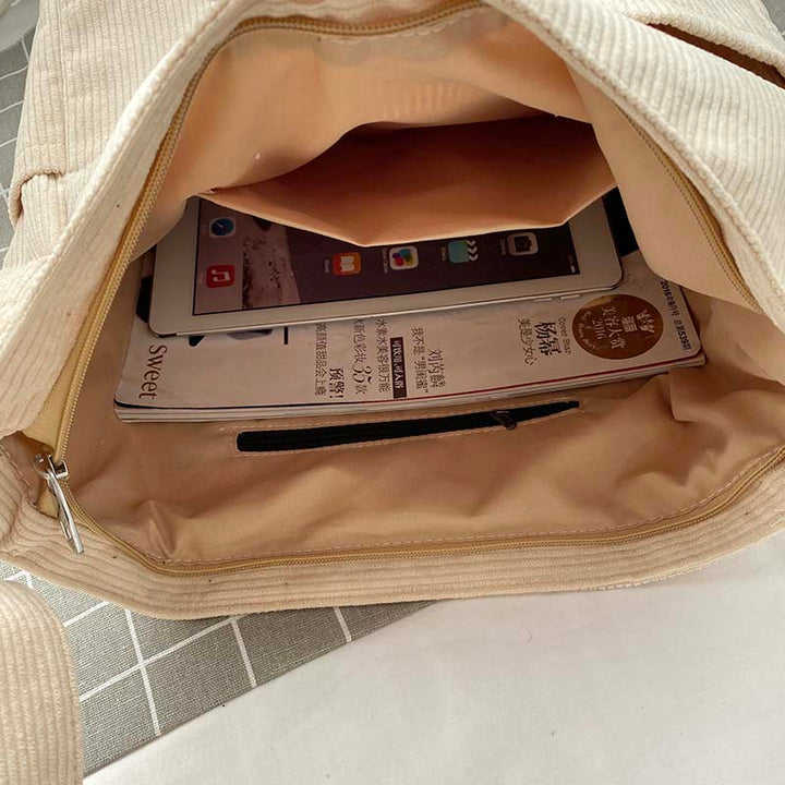 Borsa casual da donna in velluto a coste, accessorio moda confortevole e trendy.