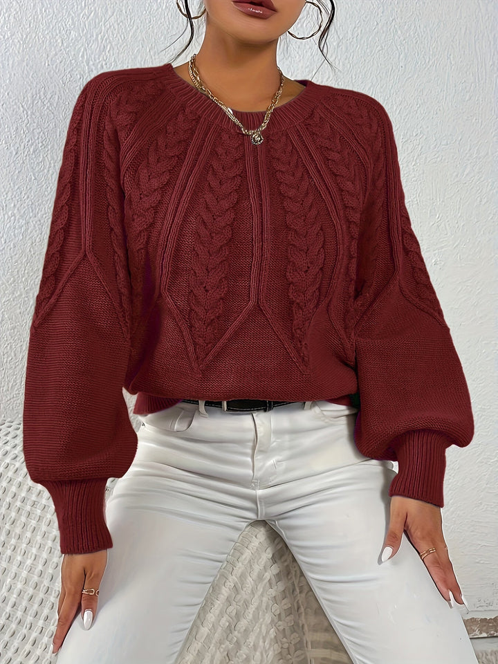 Trecce e maniche a palloncino: maglione donna comodo. Eleganza casual per ogni occasione.