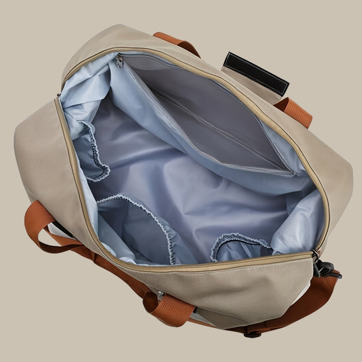 Borsone bagaglio a mano spazioso. Pratico e funzionale per viaggi brevi, fughe di weekend o come carry-on.
