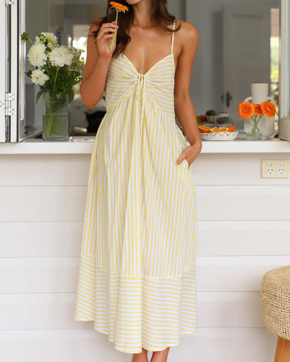 Comodo abito midi estivo donna a righe, scollo a V, vita elastica. Ideale per la moda estiva casual.
