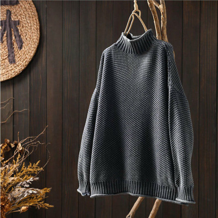 Moda invernale: maglione donna a maglia waffle beige, un capo essenziale, accogliente e chic.