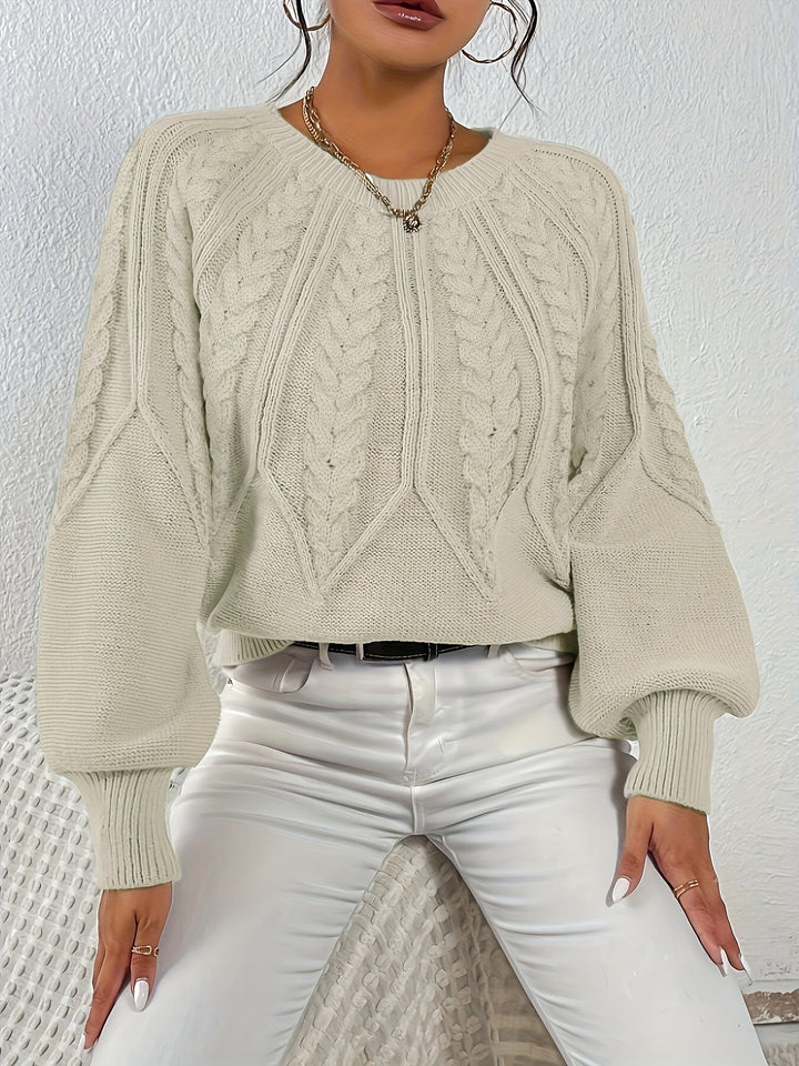 Comodo maglione donna a trecce e maniche a palloncino. Ideale per le fresche giornate autunnali.