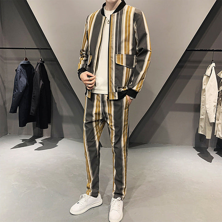 Set sportivo uomo aderente due pezzi, manica lunga e pantaloni. Ideale per allenamento, fitness o loungewear casual. Autunno/inverno.