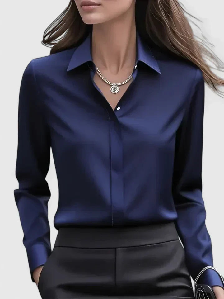 Maglia a maniche lunghe donna, bottoni nascosti e orlo curvo, ideale per la moda femminile moderna.