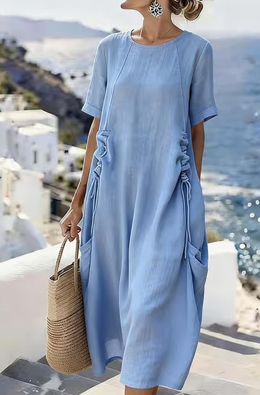 Abito midi donna ampio in cotone lino traspirante, maniche corte, estivo e casual per spiaggia e vacanza.