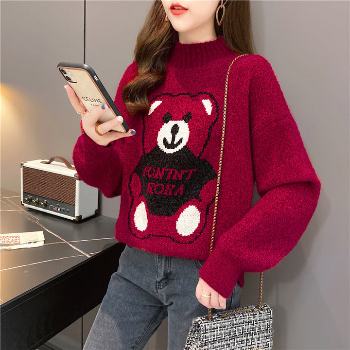 Pullover donna vestibilità ampia con orso, ideale per outfit autunnali colorati e di tendenza.