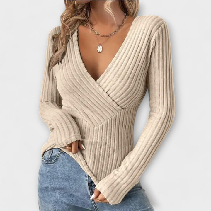 Maglione donna scollo a V intrecciato, maniche lunghe. Design elegante e comodo per ogni outfit quotidiano.