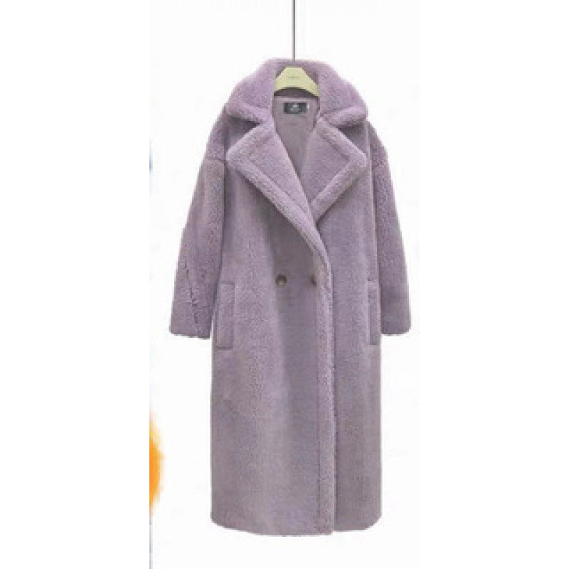 Caldo cappotto lungo da donna in tessuto peluche, morbido e lussuoso per un comfort invernale.
