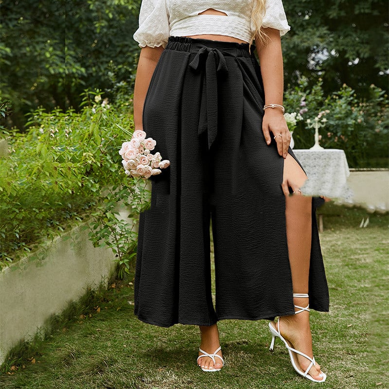 Pantaloni donna vita alta a gamba larga, stile cropped con fibbia. Ideali per outfit eleganti e casual.