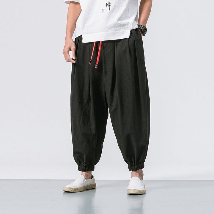 Pantaloni harem uomo verde militare, vestibilità larga. Vita regolabile, perfetti per look casual e streetwear.