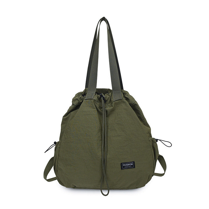 Pratico zaino donna leggero in nylon con cordino regolabile, perfetto per viaggi e uso casual quotidiano.