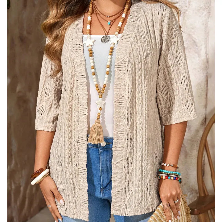 Cardigan donna versatile, traforato e leggero, con maniche 3/4. Nuovi arrivi moda.