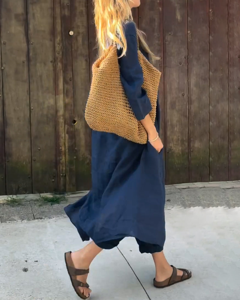 Outfit estivo leggero da donna: tunica ampia e pantaloni in cotone/lino per massimo comfort casual.