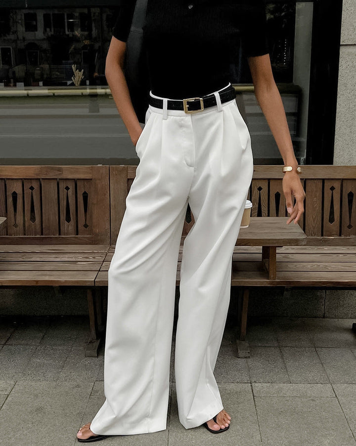 Pantaloni donna vita alta ampi, gamba dritta. Comfort e stile per un look elegante da ufficio o casual.