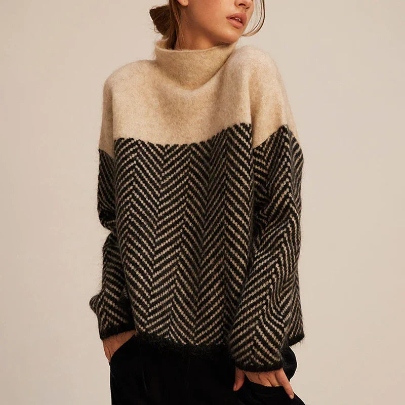 Pullover elegante da donna a collo alto, motivo spina di pesce, perfetto per un inverno caldo e chic.