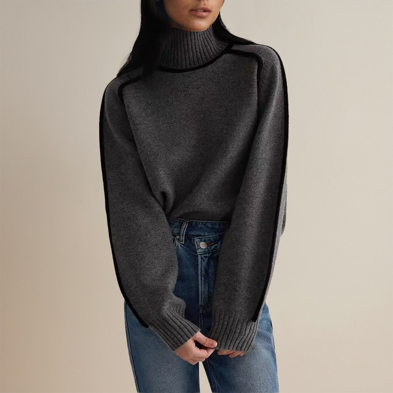 Maglione dolcevita donna, design oversize per l'autunno-inverno. Eleganza casual e massimo comfort.