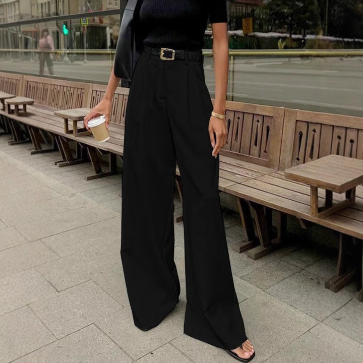 Pantaloni donna vita alta, gamba dritta, vestibilità ampia. Ideali per ufficio o look casual elegante.