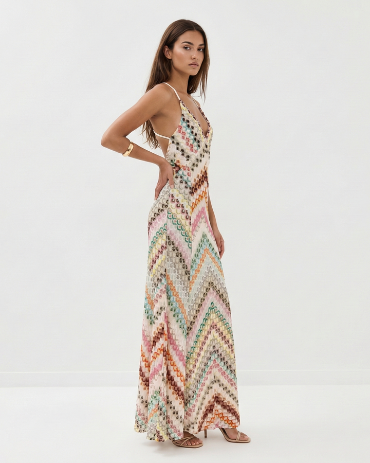 Elegante abito donna maxi crochet, schiena scoperta, ideale per un outfit estivo leggero e chic.
