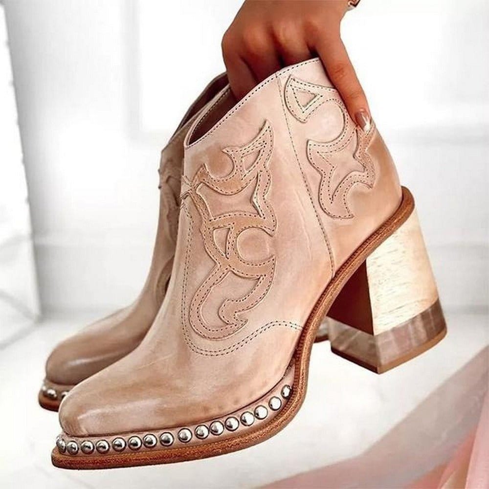Stivaletti cowboy da donna neri, in pelle sintetica con dettagli ricamati western, zip laterale e tacco largo.