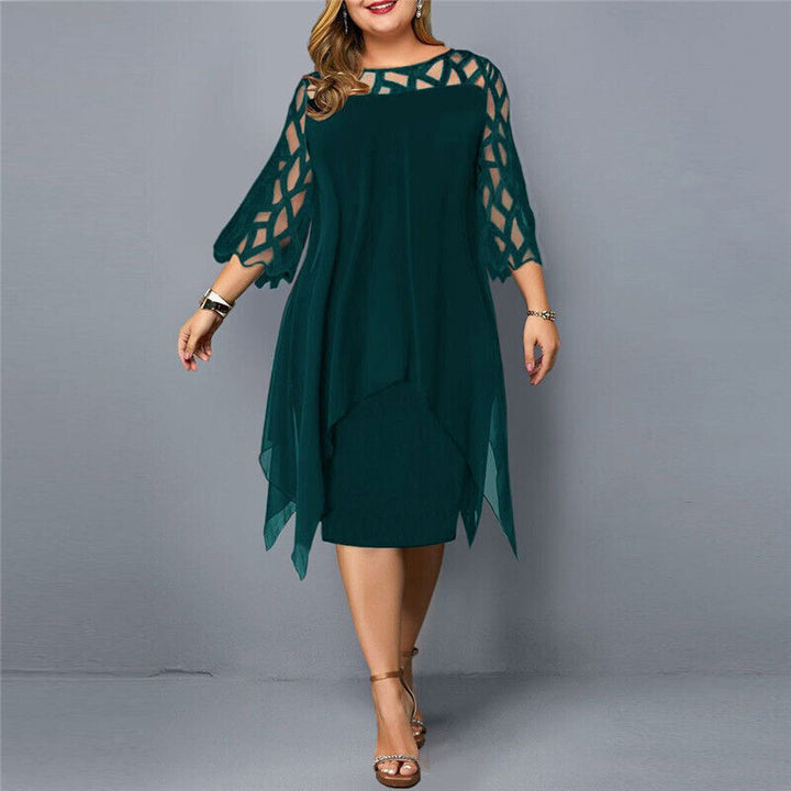 Chic abito da cerimonia rosso taglie forti, lunghezza midi, per un look raffinato e alla moda.