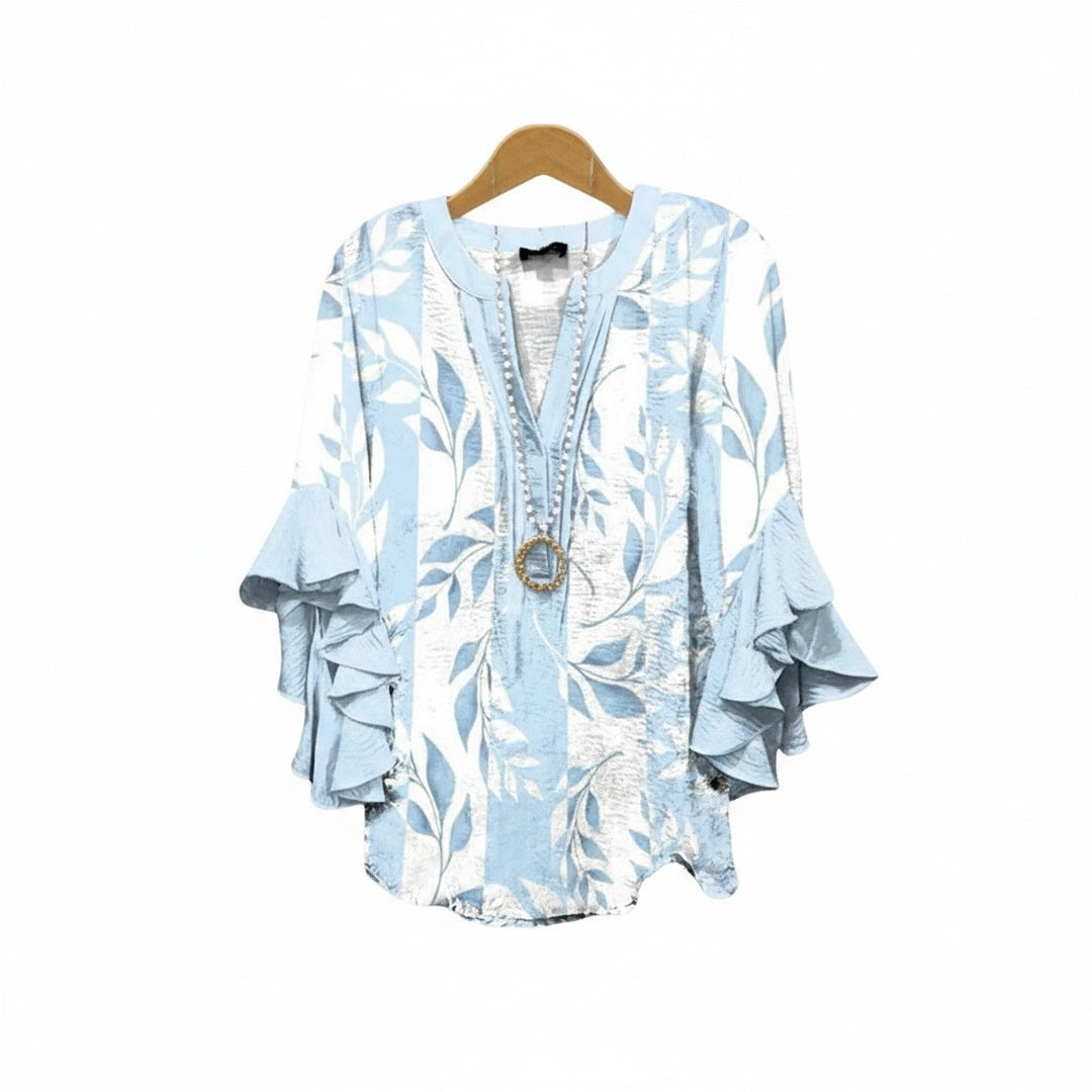 Camicetta floreale da donna leggera con scollo a V e maniche a volant, perfetta per outfit primaverili estivi.