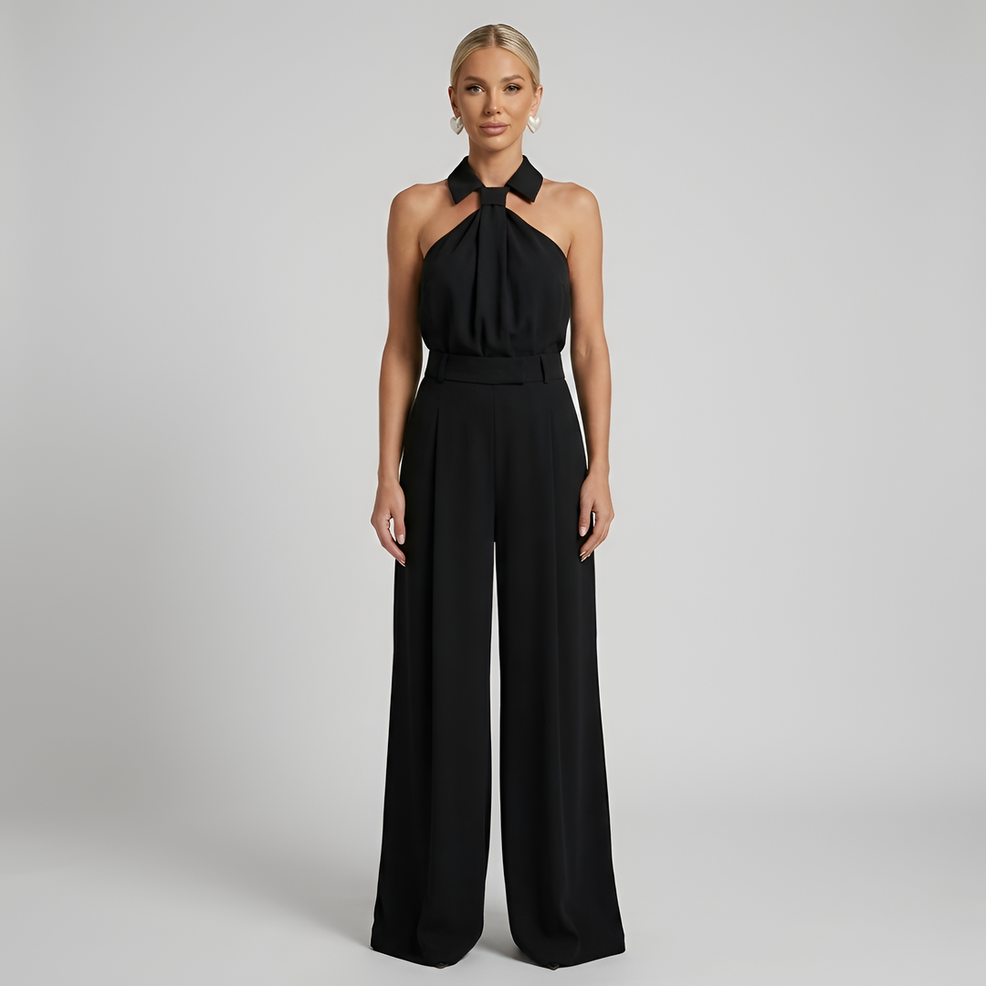 Tuta donna versatile e confortevole con collo all'americana e gamba ampia. Perfetta per un look elegante e fluido.