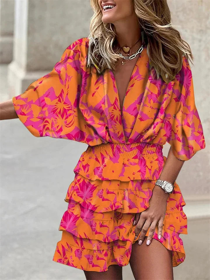 Abito donna elegante e casual per l'estate, con scollo a V, maniche corte e dettagli volant. Perfetto per ogni occasione.