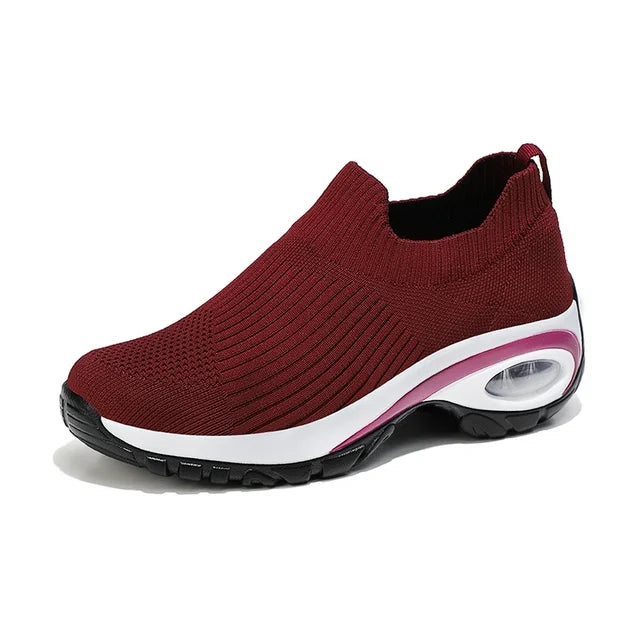Scarpe da donna AeroBounce leggere e antiscivolo, offrono correzione postura e benessere per salute piedi e ginocchia.