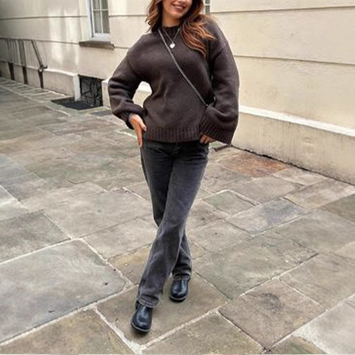 Maglia lunga donna versatile e calda, ideale per look autunno inverno. Stile comodo con maniche lunghe.