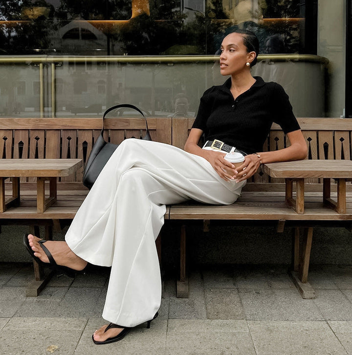 Pantaloni eleganti donna a vita alta. Modello a gamba dritta e vestibilità ampia per un tocco di classe.